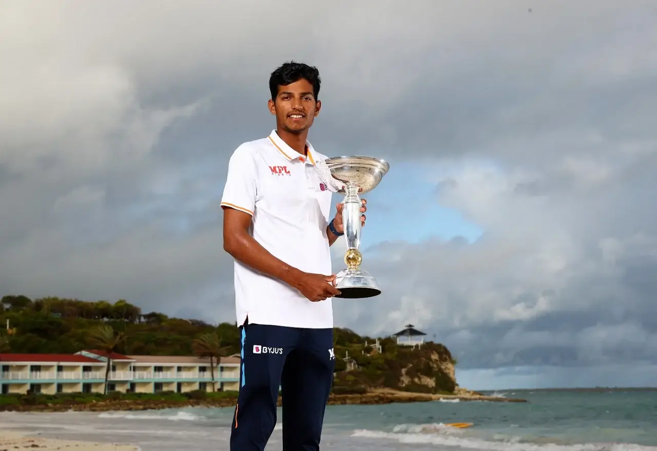 yash dhull poses with under 19 trophy